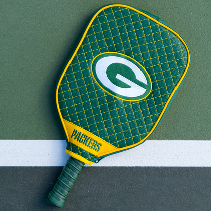 Green Bay Packers quilted pickleball paddle cover on court view