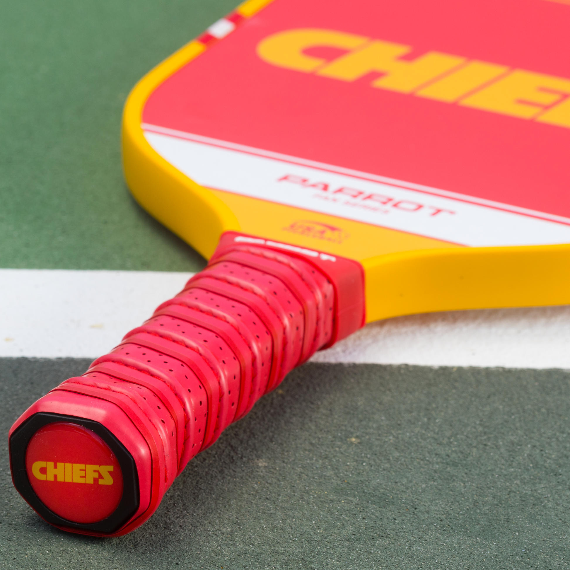 Kansas City Chiefs Sport Plus pickleball paddle on the court