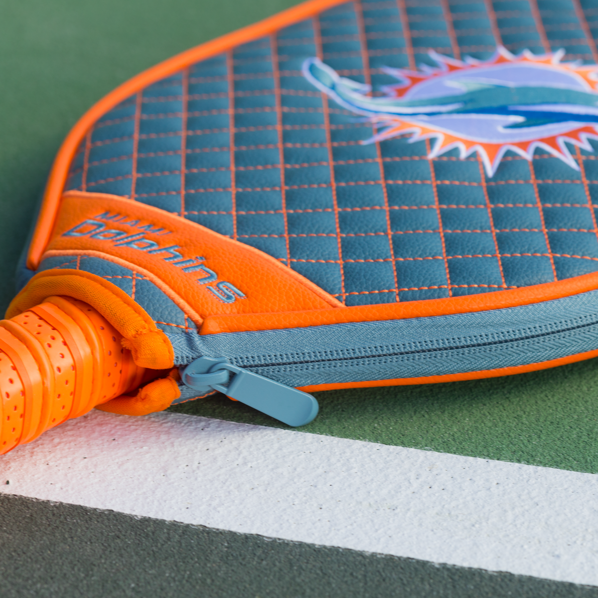 Miami Dolphins Teal quilted pickleball paddle cover closeup image