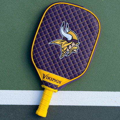 Minnesota Vikings quilted pickleball paddle cover on court view