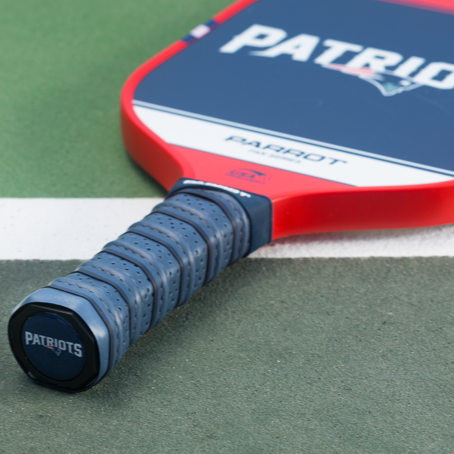 New England Patriots Sport Plus pickleball paddle on the court