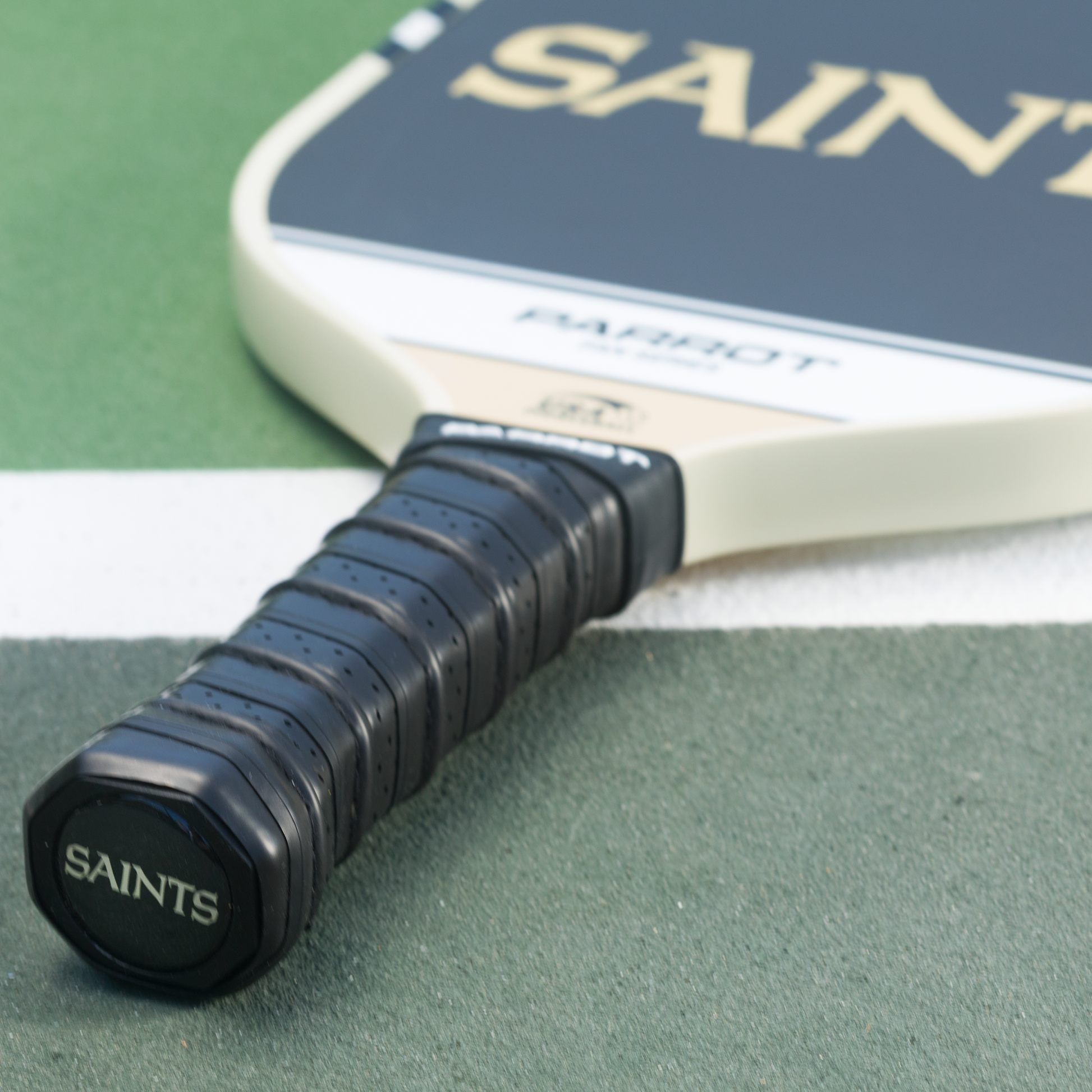 New Orleans Saints Sport Plus pickleball paddle on the court