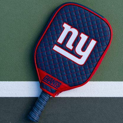 New York Giants Navy quilted pickleball paddle cover on court