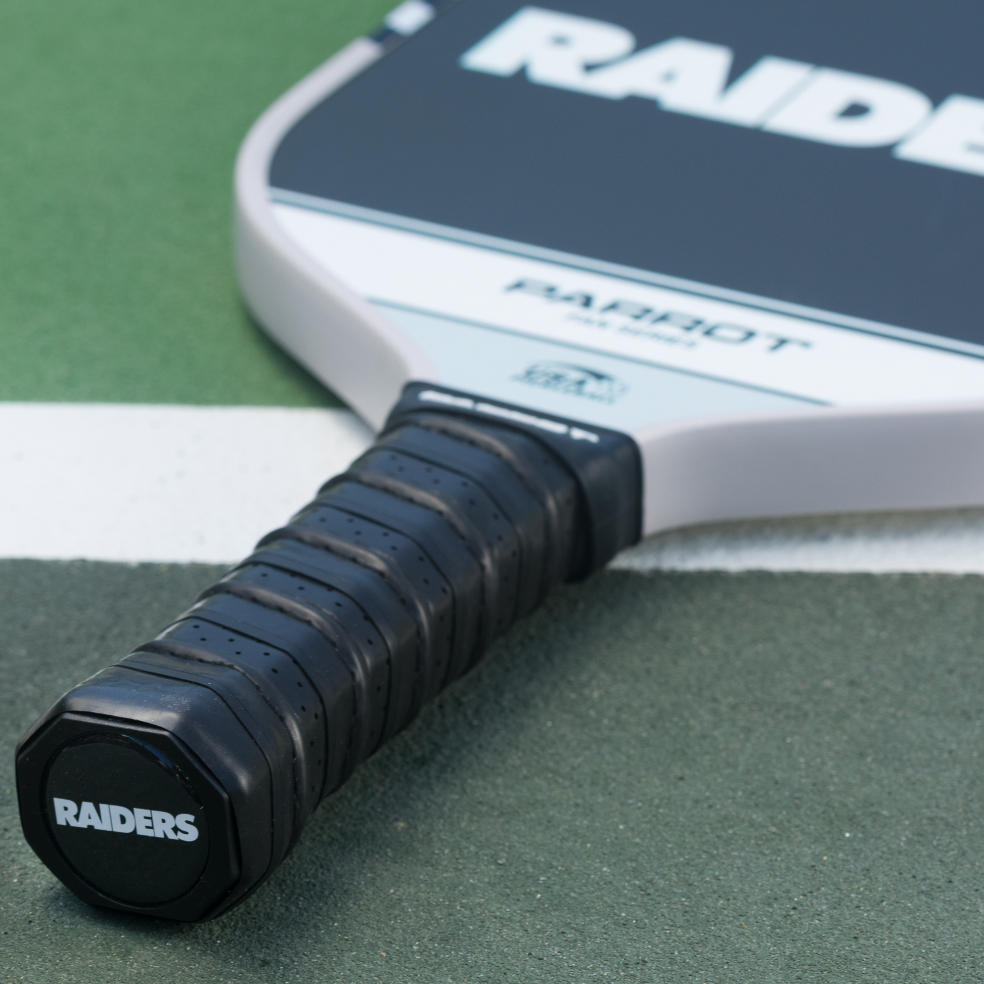 Las Vegas Raiders Sport Plus pickleball paddle on the court