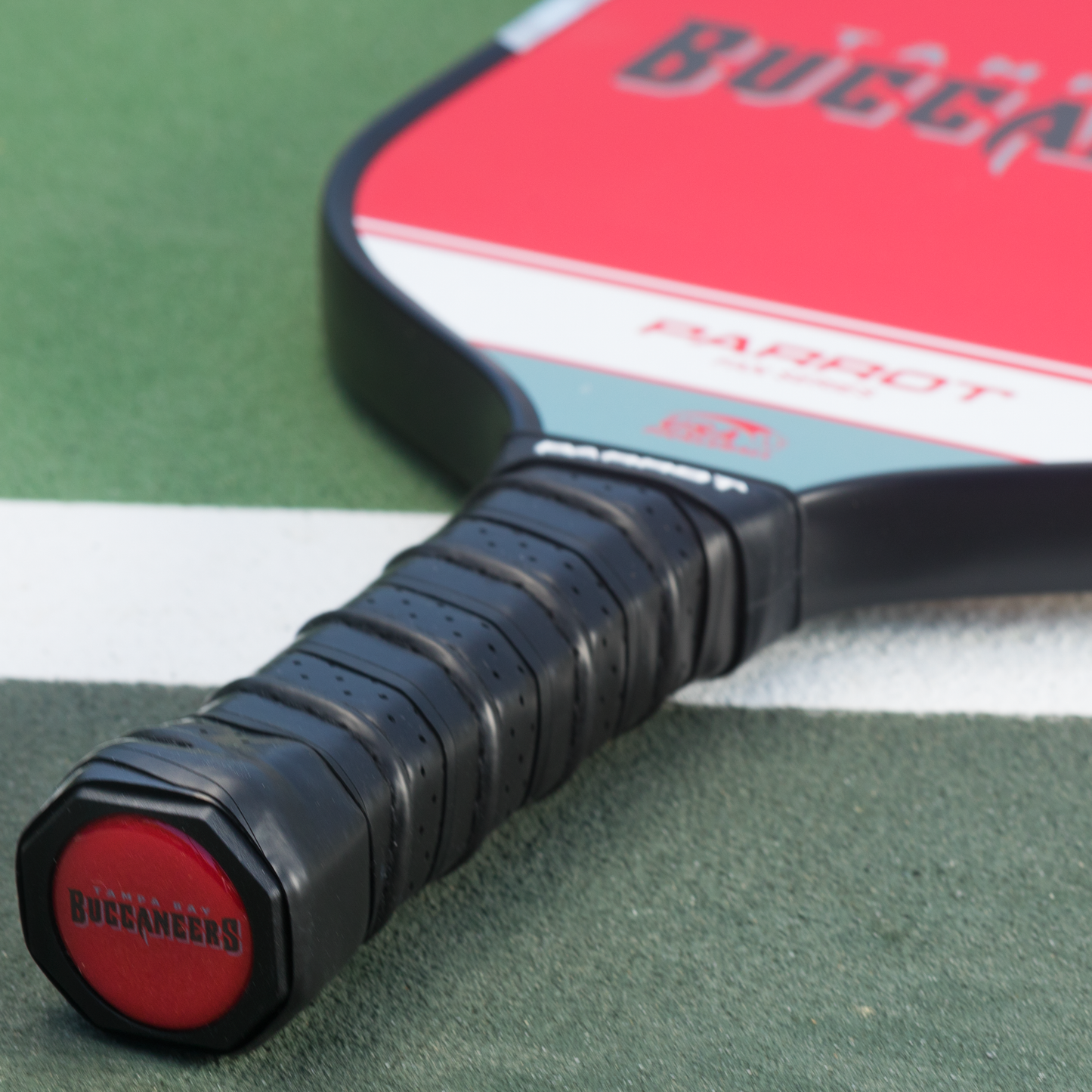 Tampa Bay Buccaneers Sport Plus pickleball paddle on the court