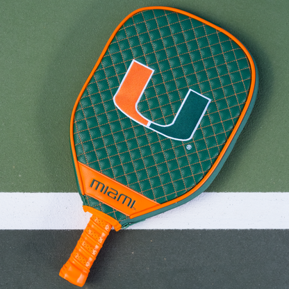Miami Hurricanes quilted pickleball paddle cover on court view