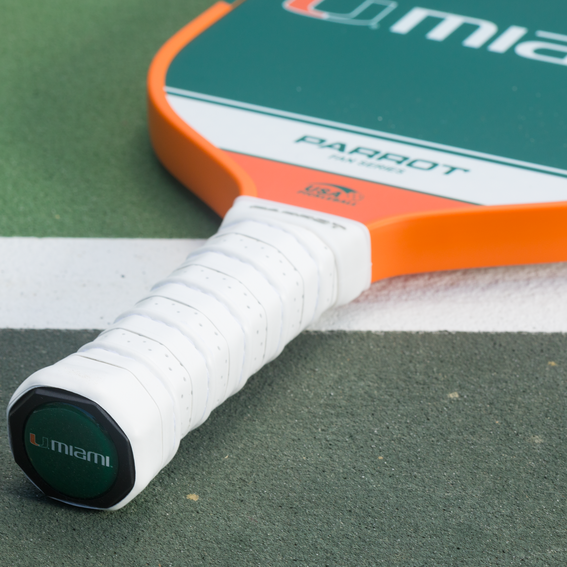 Miami Hurricanes Sport Plus pickleball paddle on the court