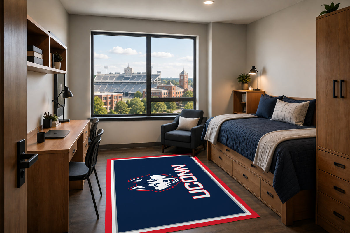 Connecticut Huskies Entry Rug in Room Setting - Officially Licensed NCAA Area Rug