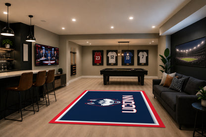 Connecticut Huskies Spirit Rug in Room Setting - Officially Licensed NCAA Area Rug