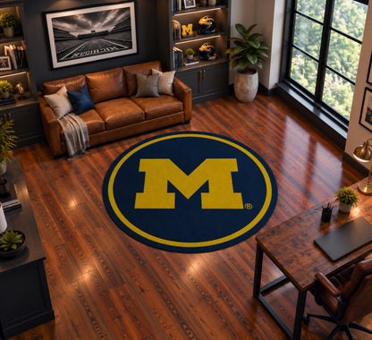 Michigan Wolverines Round Spirit Rug in Room Setting - Officially Licensed NCAA Area Rug