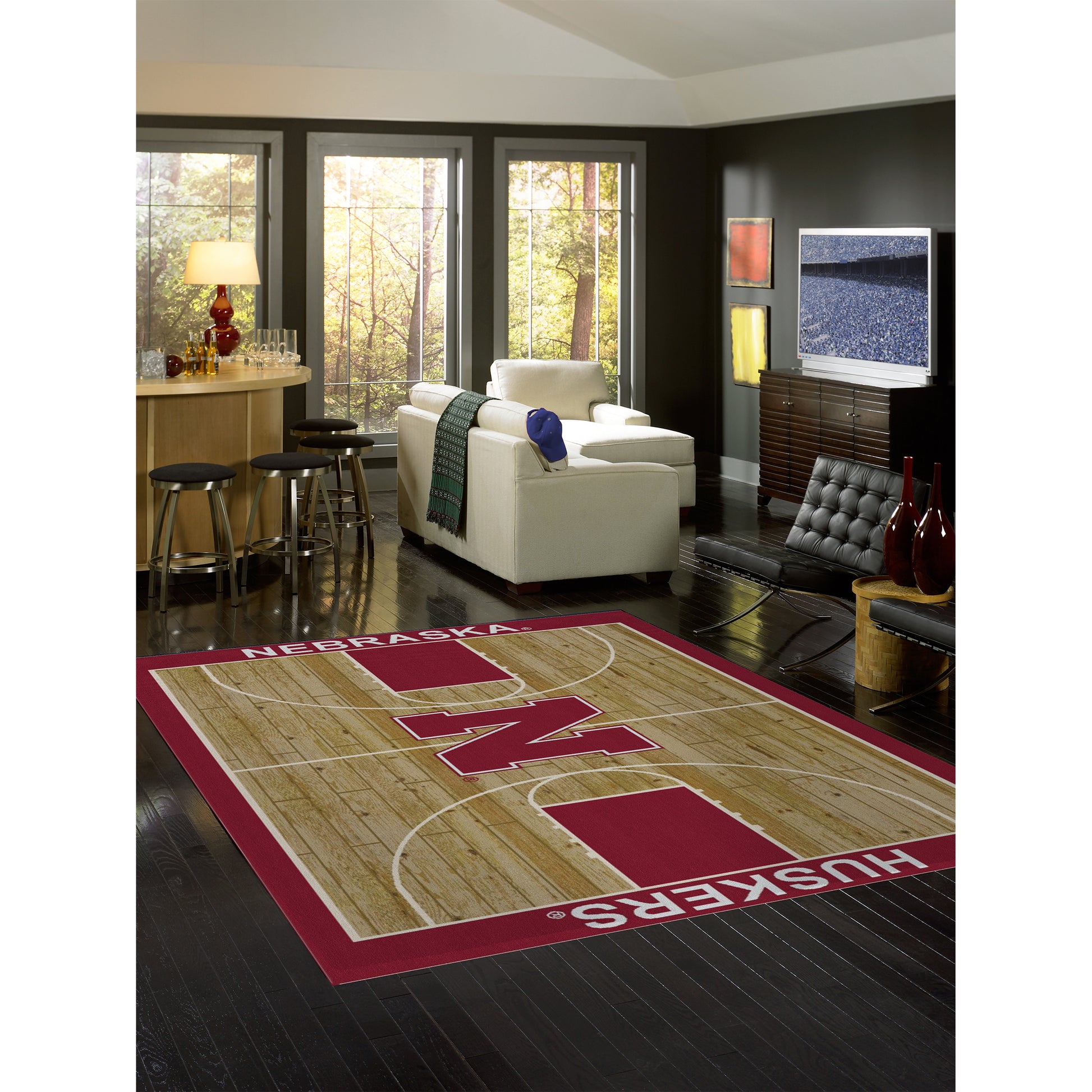 Nebraska Cornhuskers courtside style area rug lifestyle