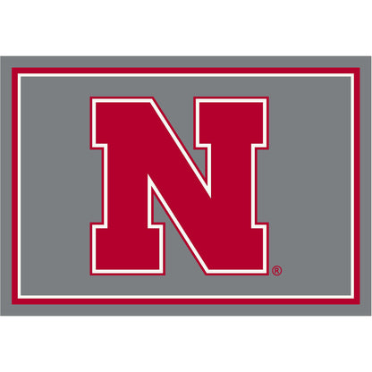 Nebraska Cornhuskers distressed style area rug