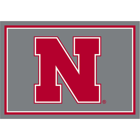 Nebraska Cornhuskers distressed style area rug