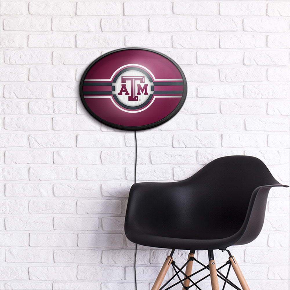 Texas A&M Aggies Slimline Oval Lighted Wall Sign Room View