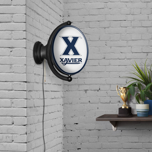 Xavier Musketeers Oval Rotating Wall Sign Room View